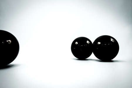 Monochrome elegant Christmas wallpaper background of tree decorations. Classy holidays image in black and white.の写真素材