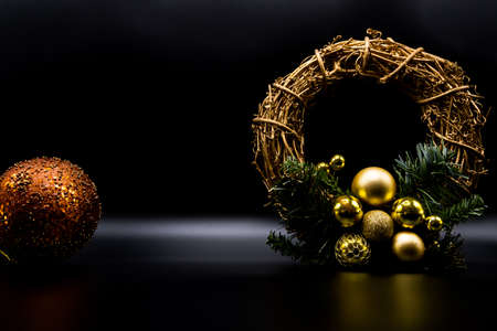 Cool holidays wallpaper background of Christmas decorations and balls or baubles on black background.の写真素材