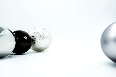 Monochrome elegant Christmas wallpaper background of tree decorations. Classy holidays image in black and white.の写真素材