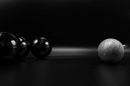 Cool holidays wallpaper background of Christmas decorations and balls or baubles on black background.の写真素材