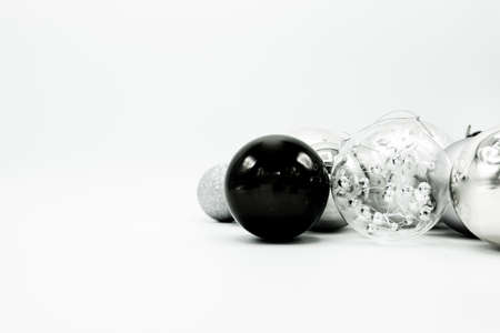 Monochrome elegant Christmas wallpaper background of tree decorations. Classy holidays image in black and white.の写真素材