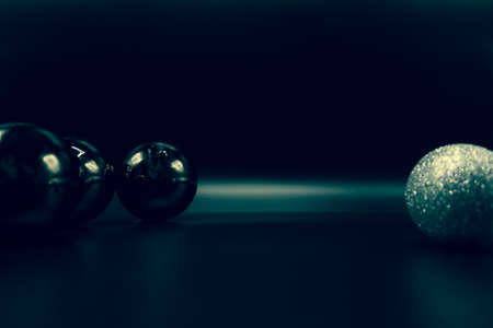 Cool holidays wallpaper background of Christmas decorations and balls or baubles on black background.の写真素材