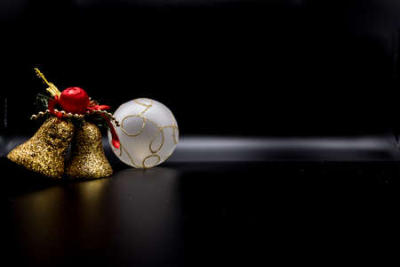 Cool holidays wallpaper background of Christmas decorations and balls or baubles on black background.の写真素材