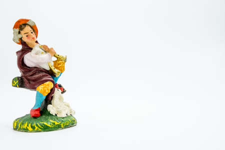 Christian nativity scene figure isolated on white background. Traditional Italian "presepe" figurines.の写真素材