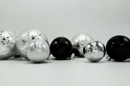 Monochrome elegant Christmas wallpaper background of tree decorations. Classy holidays image in black and white.の写真素材
