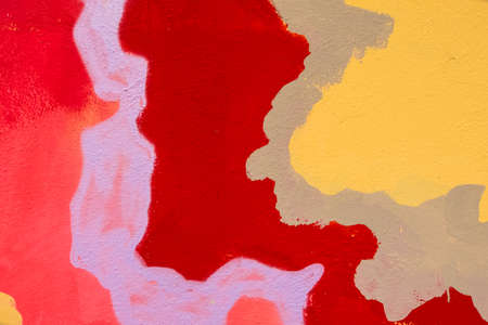 Colorful wallpaper background detail of beautiful paint in a wall. Street art style. No people.の写真素材