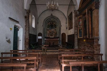 Interior of a simple medieval church with white wallsの写真素材