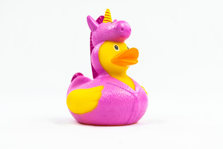 Funny pink unicorn costume on Duck Floating Toyの写真素材