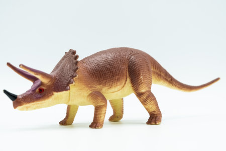 Schleich Triceratops dinosaur toy on white backgroundの写真素材