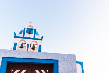 traditional greek village Oia of Santorini, with blue domesの写真素材