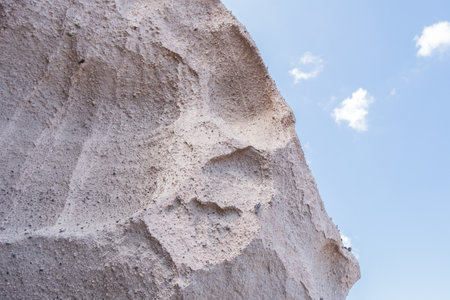 Texture of the sandstone cliffs of Santorini island, Greece.の写真素材