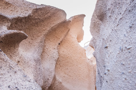 Unique texture of the sandstone cliffs of Santorini island, Greece.の写真素材
