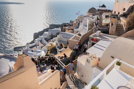Top view of the town of Oia in Santorini Greece almost at famous sunset time.の写真素材
