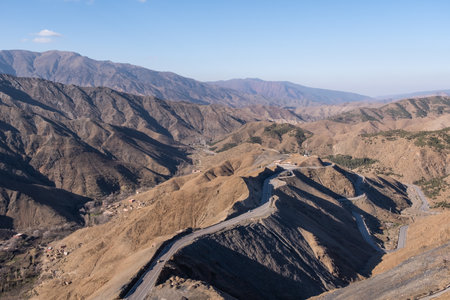 A winding mountain road with breathtaking views around every turnの写真素材