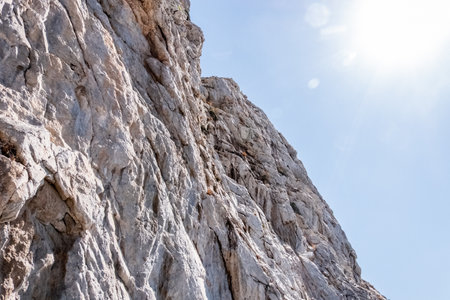 Rock face of a mountain composed of sand accumulated over the yearsの写真素材