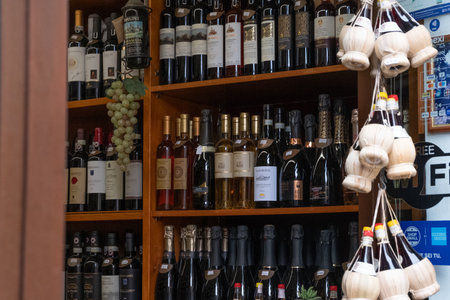 Red wines, white wines, prosecco and champagne along with other typical products for sale.の写真素材