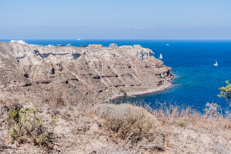 The rock face of the volcanic island of santoriniの写真素材