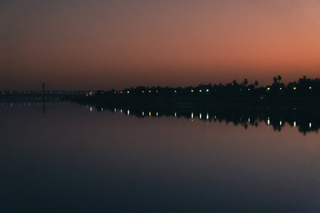 Dawns Embrace: Serene Nile River Sunrise from the Cruise Shipの写真素材