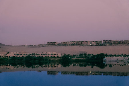 Dawns Embrace: Serene Nile River Sunrise from the Cruise Shipの写真素材