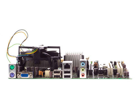 Motherboard of an old computer with a heatsinkの写真素材