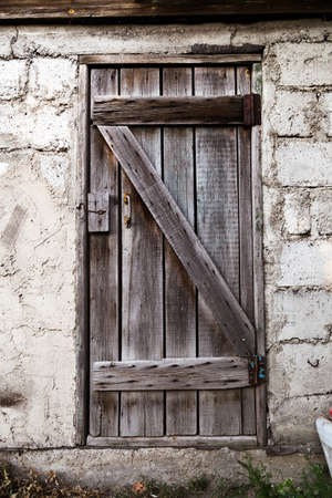 Old decayed wooden door .の写真素材