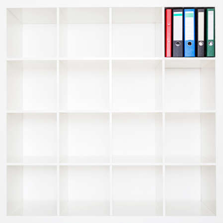 File folders, standing on the shelves at office.の写真素材