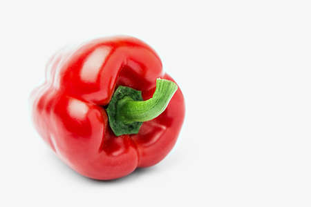Sweet pepper isolated on a white background . Red pepper over white backgroundの写真素材