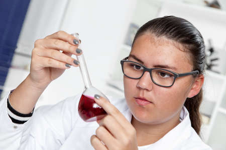 High School student. Student working at laboratory class.