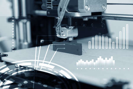 Electronic three dimensional plastic printer during work , 3D printer, 3D printingの写真素材