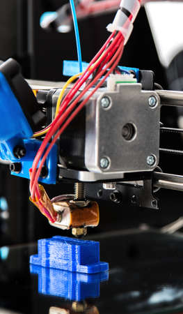 Electronic three dimensional plastic printer during work , 3D printer, 3D printing