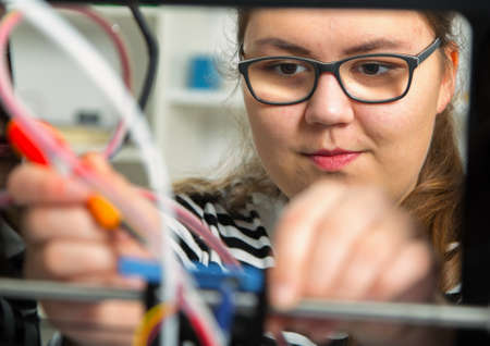 Designer Working With 3D Printer