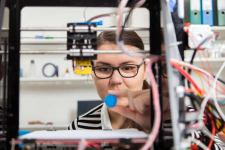 Designer Working With 3D Printer