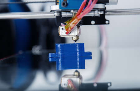 Electronic three dimensional plastic printer during work , 3D , printing.の写真素材