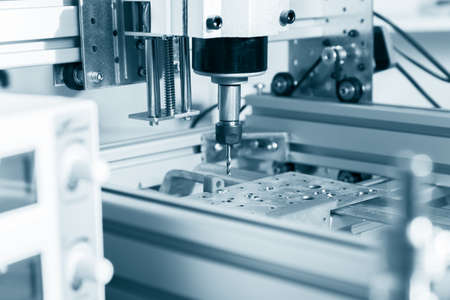 CNC milling machine working, Cutting metalwork process. Milling machine working on steel detail.