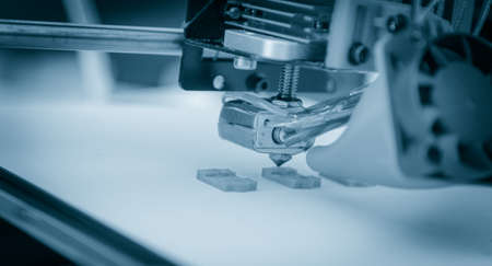 Electronic three dimensional plastic printer during work , 3D printer.