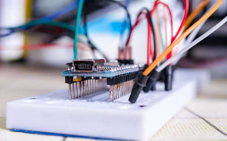 Breadboard connected to Arduino. Electronic board in hardware repair shopの写真素材