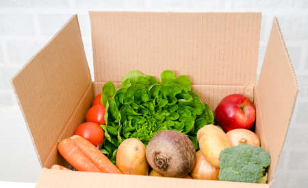 Vegetables box, delivery box. Fresh fruits and vegetables .の写真素材
