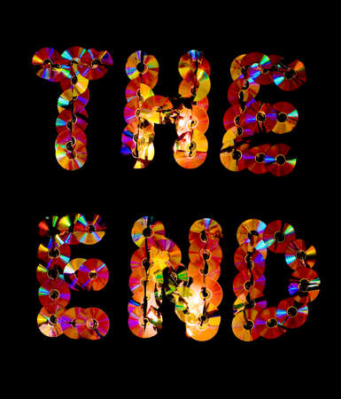 The inscription "The End" is made up of broken DVD disks on a black background.の写真素材