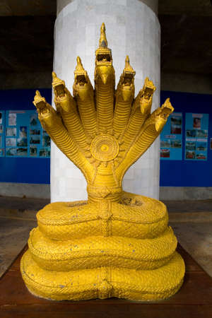 Phuket, Thailand, February 1, 2017: Buddhism. Legendary golden seven-headed snake.