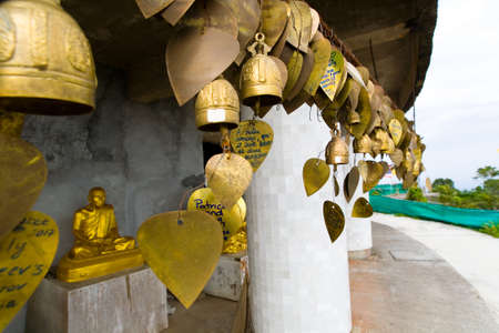 Phuket, Thailand, February 1, 2017: Buddhism. Golden leaves of a tree with desires.のeditorial素材