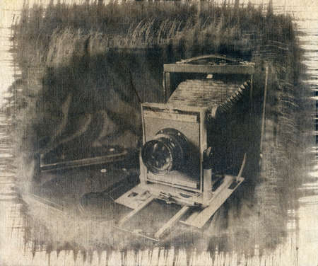 An old analogue camera in large format. Attention! The image contains the texture of the watercolor paper on which it is printed.の写真素材