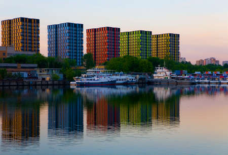 Moscow, Russia, June 12, 2017: New buildings in Moscow at dawn. New multi-colored houses on the Projected passage (opposite the Nagatinskaya embankment).のeditorial素材