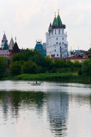 Moscow, Russia, July 5, 2013: A young couple is floating on a boat in the park.のeditorial素材
