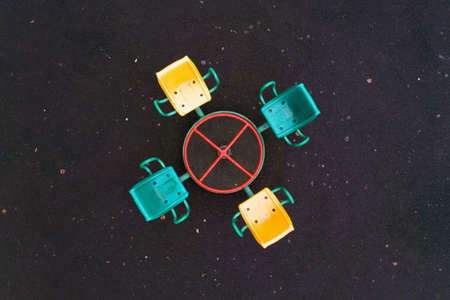 A carousel in the playground is photographed from above. Aerial photography.の写真素材
