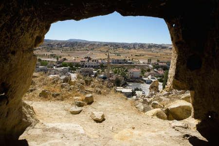 View from the cave to the mosque and the city of Chavushin. Turkey.の写真素材