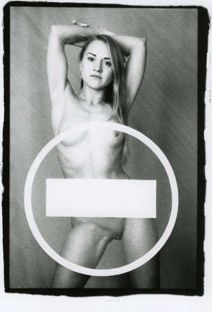 Naked beautiful girl and the signの写真素材