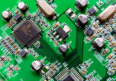 Green electronic video capture card close-up. Closeup.の写真素材