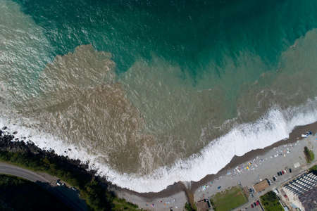 Storm and vacationers on the Black Sea coast. Aerial photography.