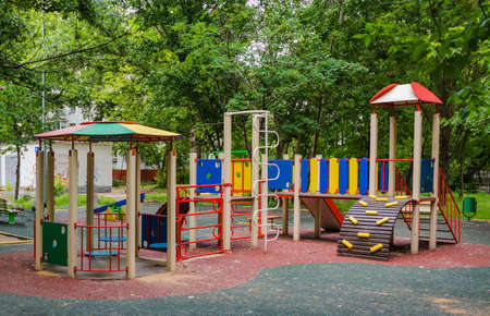 Children playground in the yard in summer