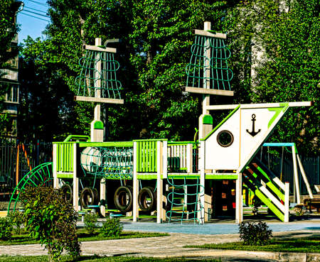 Children playground in the yard in summerの写真素材